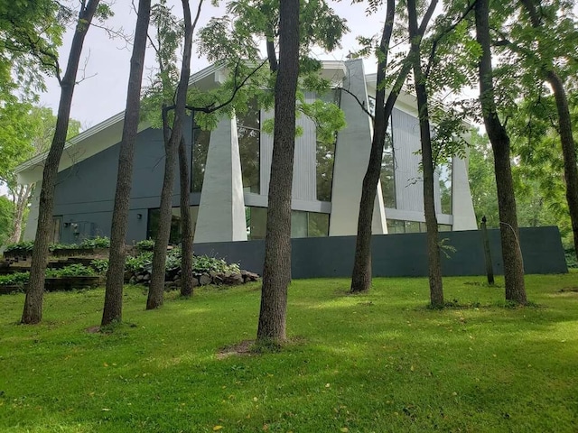 8100 160th Ave, Bristol, WI 53104 - view of side of property with stucco siding and a yard