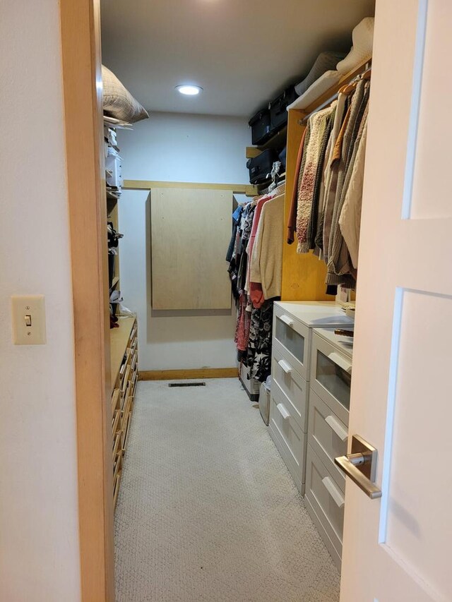 8100 160th Ave, Bristol, WI 53104 - walk in closet with light carpet and visible vents