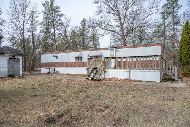 N7363 Wahneeta Ave, New Lisbon, WI 53950 - view of front facade featuring a deck