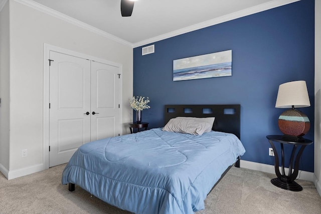 6612 Florance Ruth Ln, Sun Prairie, WI 53590 - bedroom featuring carpet flooring, crown molding, baseboards, a closet, and a ceiling fan