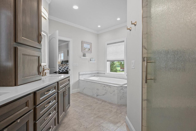 6612 Florance Ruth Ln, Sun Prairie, WI 53590 - bathroom with a bath, crown molding, double vanity, a stall shower, and recessed lighting