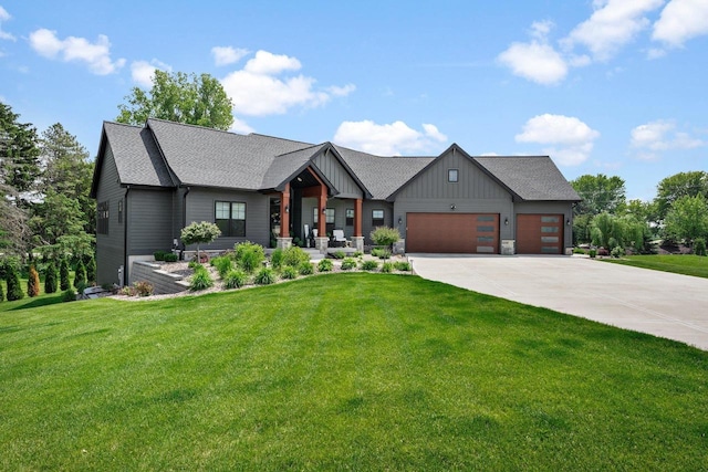 6612 Florance Ruth Ln, Sun Prairie, WI 53590 - modern farmhouse featuring an attached garage, concrete driveway, board and batten siding, and a front yard