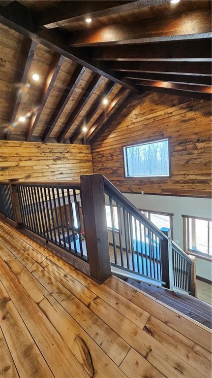 11960 US Highway 63, Hayward, WI 54843 - interior space with wood ceiling, wooden walls, wood-type flooring, and vaulted ceiling with beams