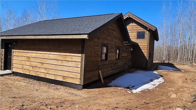11960 US Highway 63, Hayward, WI 54843 - view of home's exterior featuring roof with shingles
