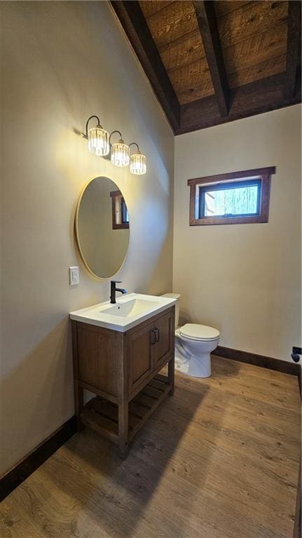 11960 US Highway 63, Hayward, WI 54843 - bathroom with beamed ceiling, baseboards, and wood finished floors