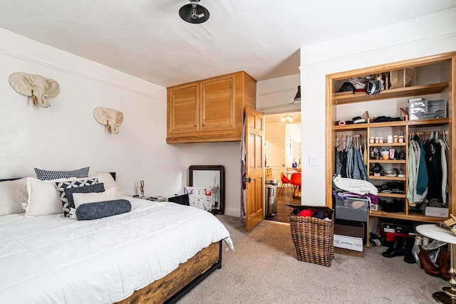 carpeted bedroom featuring a closet