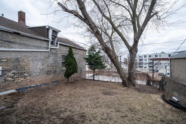 view of yard with fence