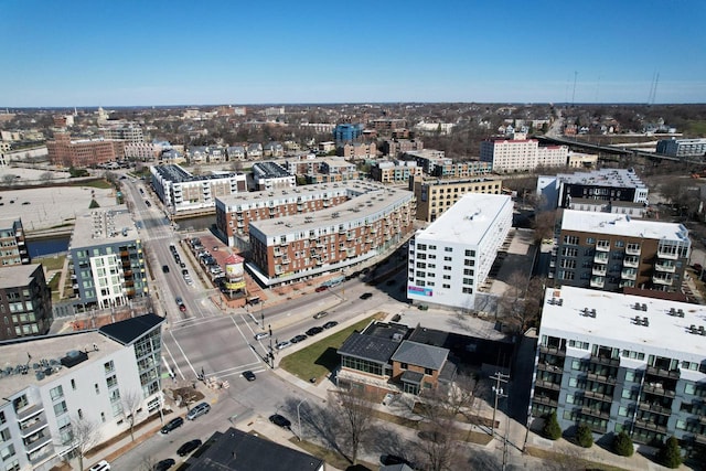 birds eye view of property featuring a city view