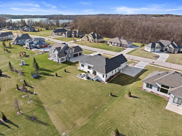 birds eye view of property with a residential view