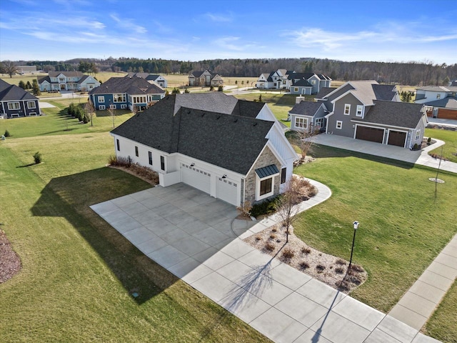 drone / aerial view with a residential view