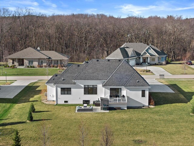 aerial view with a wooded view