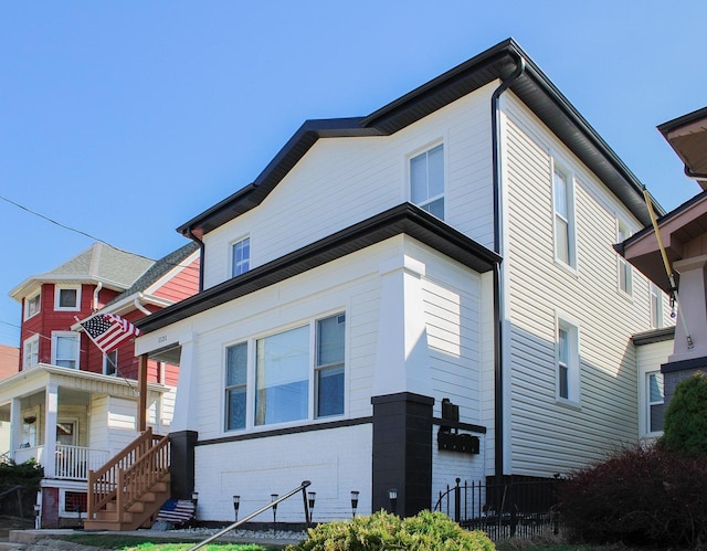 view of side of home featuring brick siding