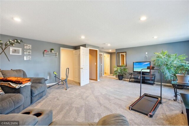 219 Bluff Dr, Somerset, WI 54025 - living area featuring recessed lighting, baseboards, and carpet floors
