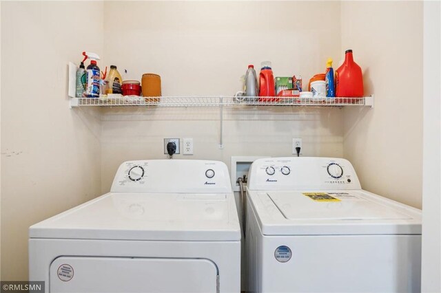 219 Bluff Dr, Somerset, WI 54025 - laundry room with laundry area and washer and clothes dryer