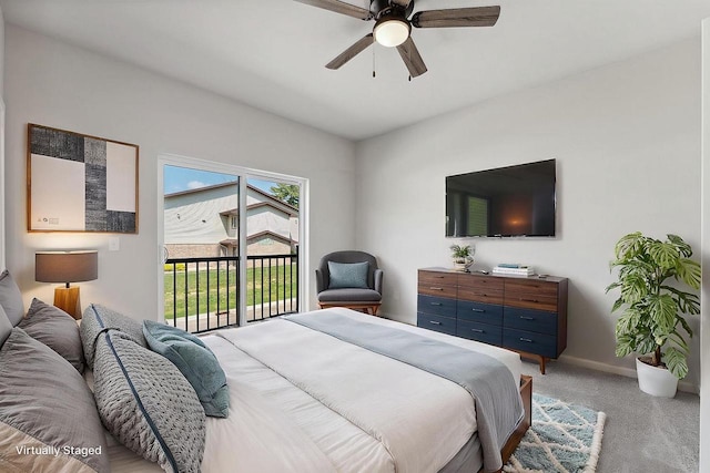 216 S Dewey Ave, Reedsburg, WI 53959 - carpeted bedroom featuring access to exterior, baseboards, and ceiling fan