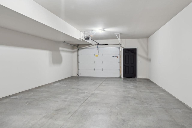 216 S Dewey Ave, Reedsburg, WI 53959 - garage featuring a garage door opener