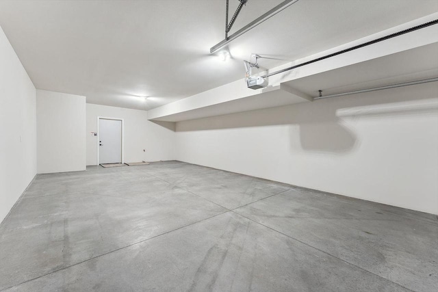 216 S Dewey Ave, Reedsburg, WI 53959 - garage with a garage door opener