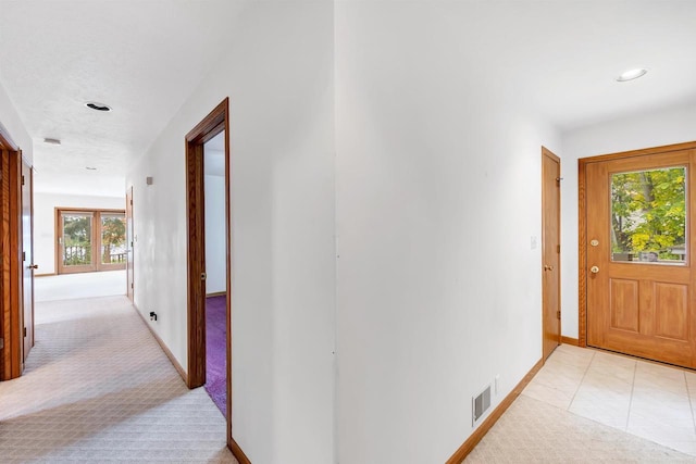 W8547 Cloverleaf Lake Rd, Clintonville, WI 54929 - hall with light colored carpet, plenty of natural light, baseboards, and recessed lighting