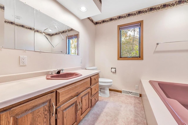 W8547 Cloverleaf Lake Rd, Clintonville, WI 54929 - full bathroom featuring toilet, baseboards, vanity, and a tub