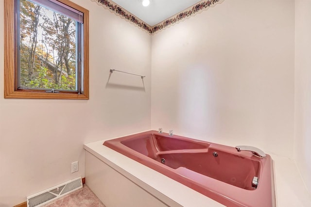 W8547 Cloverleaf Lake Rd, Clintonville, WI 54929 - full bathroom with a tub with jets and baseboards