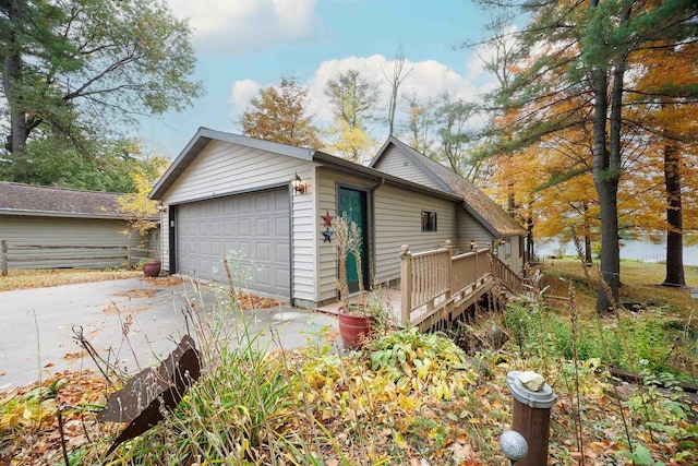 W8547 Cloverleaf Lake Rd, Clintonville, WI 54929 - view of side of home featuring a garage and a deck