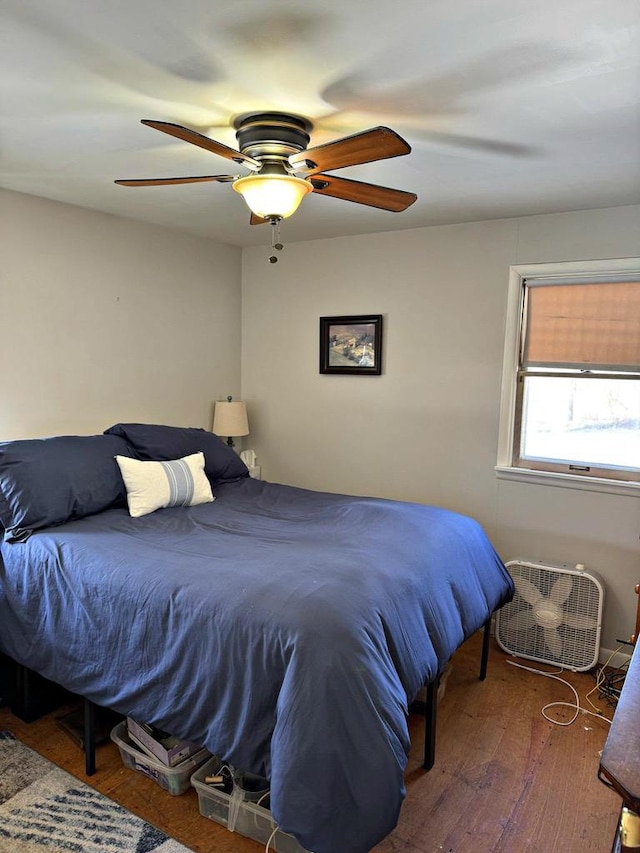 N8193 M35, Cedar River, MI 49887 - bedroom featuring ceiling fan and wood finished floors