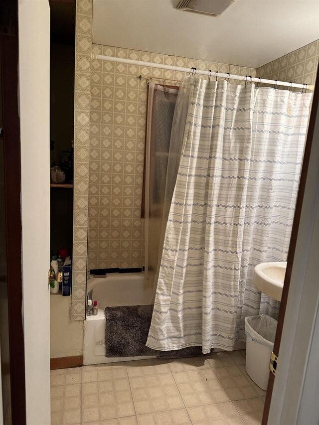 N8193 M35, Cedar River, MI 49887 - bathroom featuring tile patterned floors, shower / tub combo with curtain, and visible vents