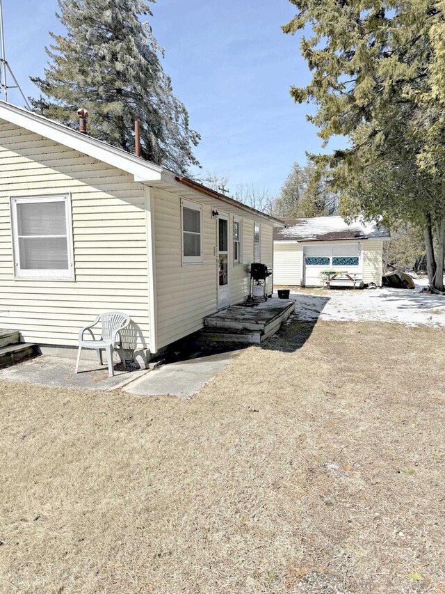 N8193 M35, Cedar River, MI 49887 - back of house featuring a patio area and an outdoor structure