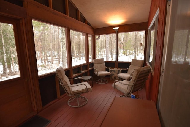 W1514 Spirit Ridge Trl, Keshena, WI 54135 - sunroom / solarium with lofted ceiling, plenty of natural light, and wood-type flooring