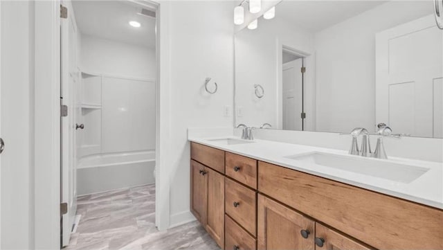 1517 Creekwood Dr, New Richmond, WI 54017 - full bathroom with double vanity and washtub / shower combination