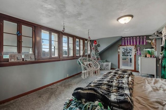 8283 345th St, Stanley, WI 54768 - unfurnished bedroom featuring baseboards and carpet flooring