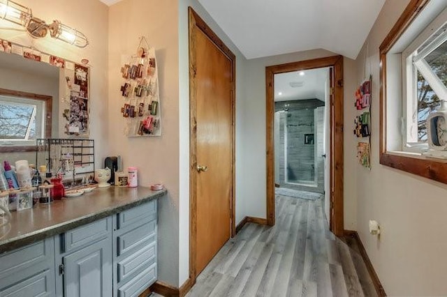 8283 345th St, Stanley, WI 54768 - hall with light wood-type flooring and baseboards