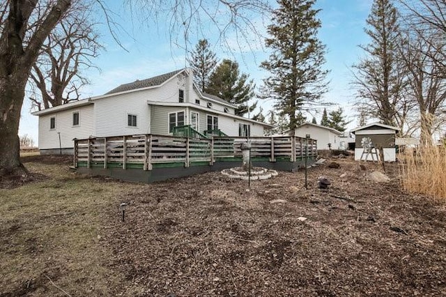 8283 345th St, Stanley, WI 54768 - view of side of home featuring a deck
