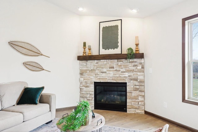 6101 Fox Run Ln, Mount Pleasant, WI 53406 - living room with a fireplace, baseboards, and wood finished floors