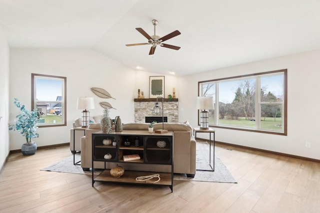 6101 Fox Run Ln, Mount Pleasant, WI 53406 - living room featuring a fireplace, a ceiling fan, wood finished floors, lofted ceiling, and baseboards
