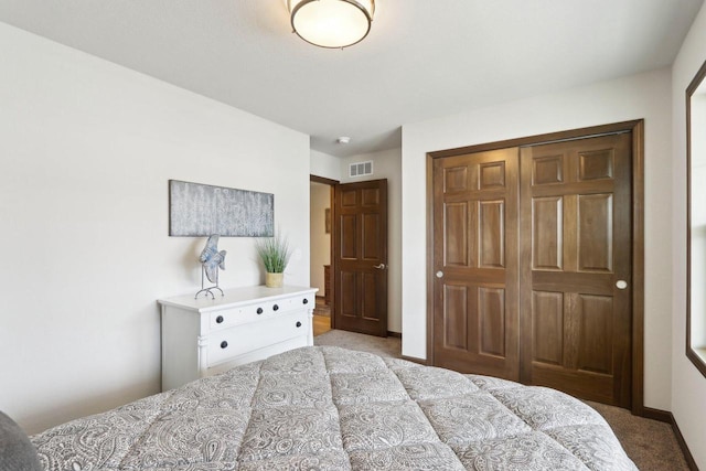 6101 Fox Run Ln, Mount Pleasant, WI 53406 - bedroom with a closet, visible vents, baseboards, and carpet floors