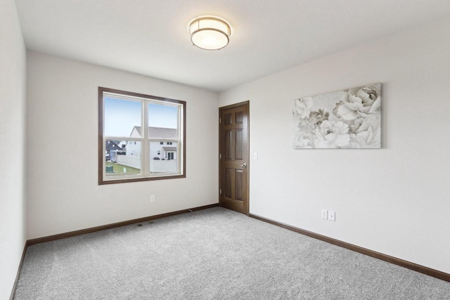 6101 Fox Run Ln, Mount Pleasant, WI 53406 - carpeted empty room featuring baseboards