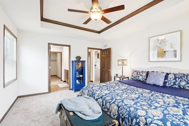 6101 Fox Run Ln, Mount Pleasant, WI 53406 - bedroom featuring visible vents, carpet floors, baseboards, and a raised ceiling