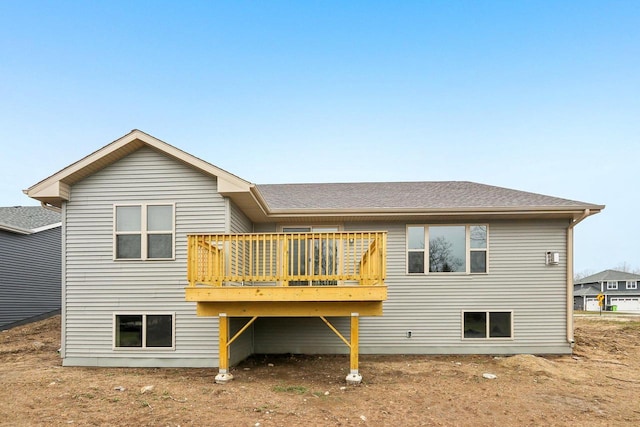 6101 Fox Run Ln, Mount Pleasant, WI 53406 - rear view of house with roof with shingles and a deck