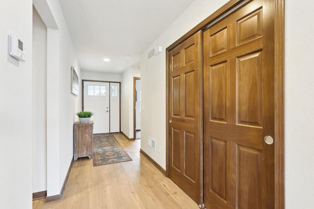 6101 Fox Run Ln, Mount Pleasant, WI 53406 - interior space featuring light wood-type flooring, baseboards, and visible vents