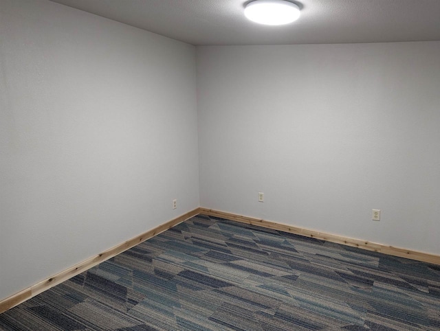 2123 French St, Friendship, WI 53934 - spare room featuring dark carpet and baseboards