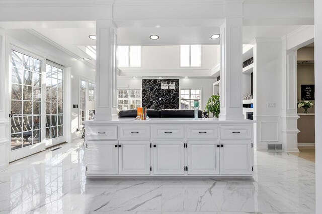 N4455 Dorothy Jane Ct, Kaukauna, WI 54130 - kitchen with decorative columns, marble finish floor, and crown molding