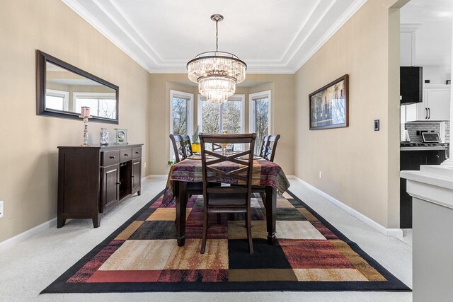 N4455 Dorothy Jane Ct, Kaukauna, WI 54130 - dining space featuring baseboards, light colored carpet, an inviting chandelier, and ornamental molding