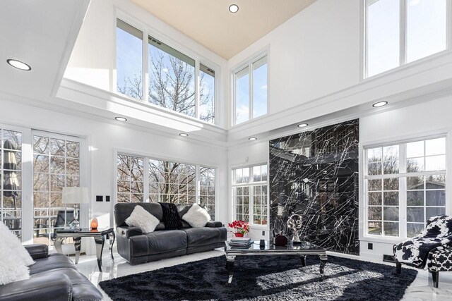 N4455 Dorothy Jane Ct, Kaukauna, WI 54130 - living area featuring a wealth of natural light, recessed lighting, marble finish floor, and an accent wall