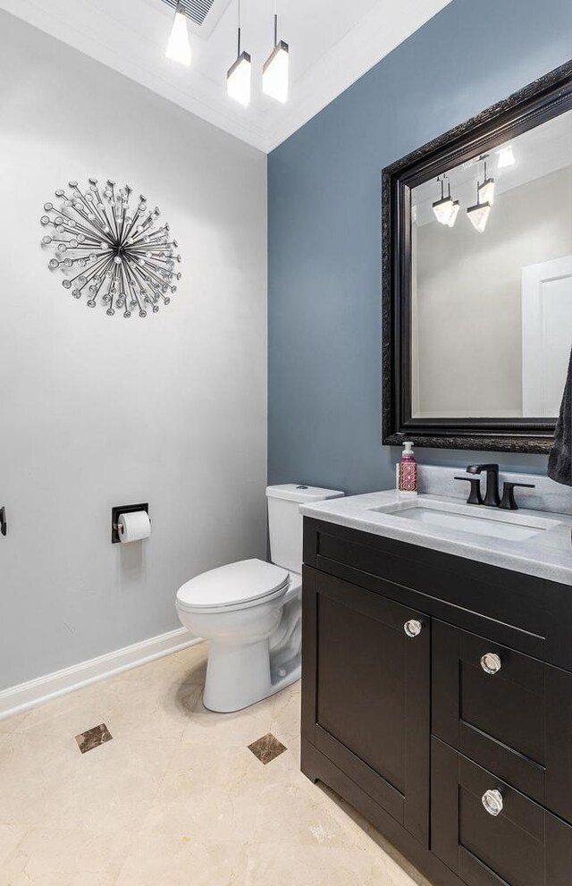 N4455 Dorothy Jane Ct, Kaukauna, WI 54130 - bathroom featuring toilet, crown molding, vanity, and baseboards