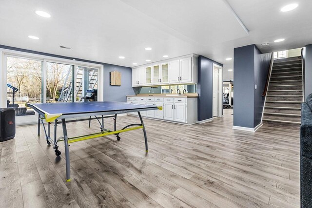 N4455 Dorothy Jane Ct, Kaukauna, WI 54130 - recreation room with a sink, light wood finished floors, and recessed lighting
