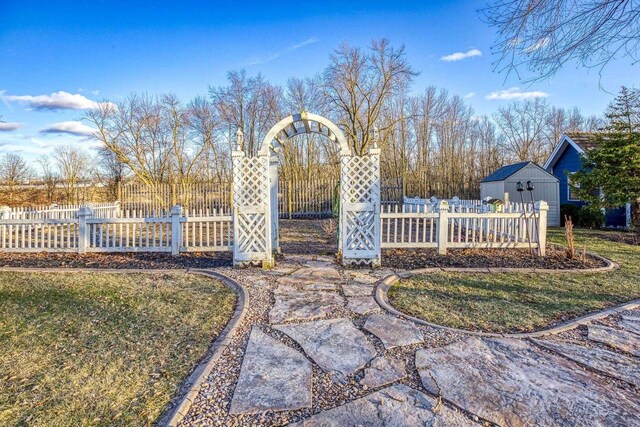 N4455 Dorothy Jane Ct, Kaukauna, WI 54130 - view of yard featuring an outbuilding, a shed, and a fenced front yard