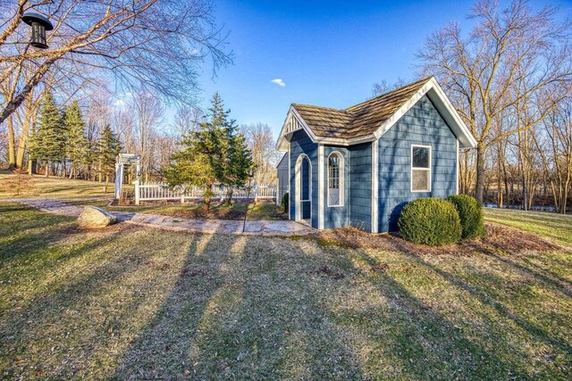 N4455 Dorothy Jane Ct, Kaukauna, WI 54130 - view of property exterior with a yard and fence