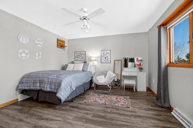 9842 Elan Rd, Tomah, WI 54660 - bedroom featuring wood finished floors, baseboards, and ceiling fan
