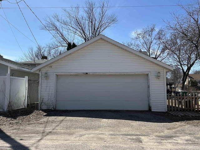 detached garage with fence